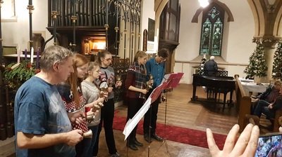 Young musicians playing at an All Age service in St Barnabas